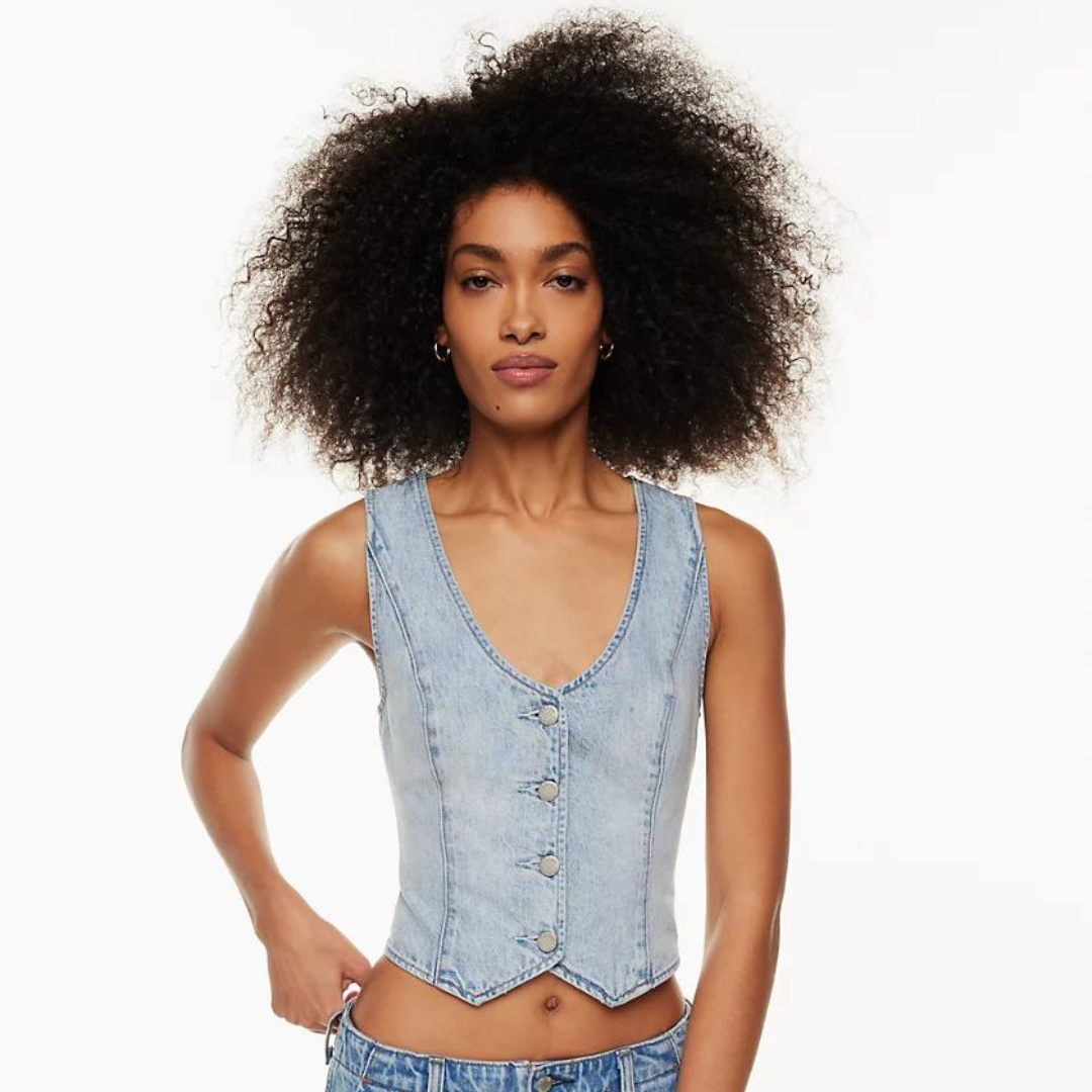 image of a woman wearing a denim button up vest
