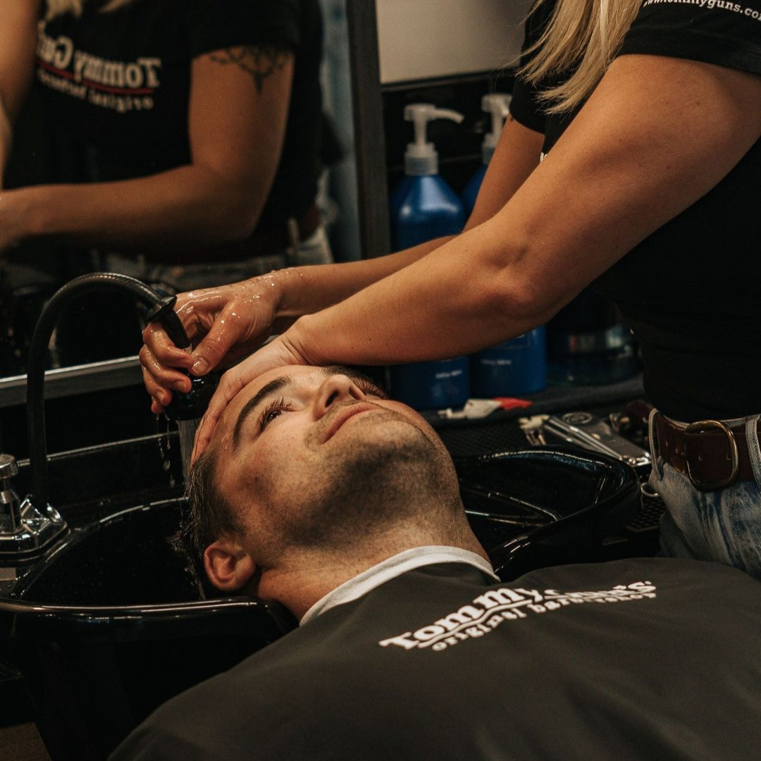 image of a man getting his hair washed at a salon