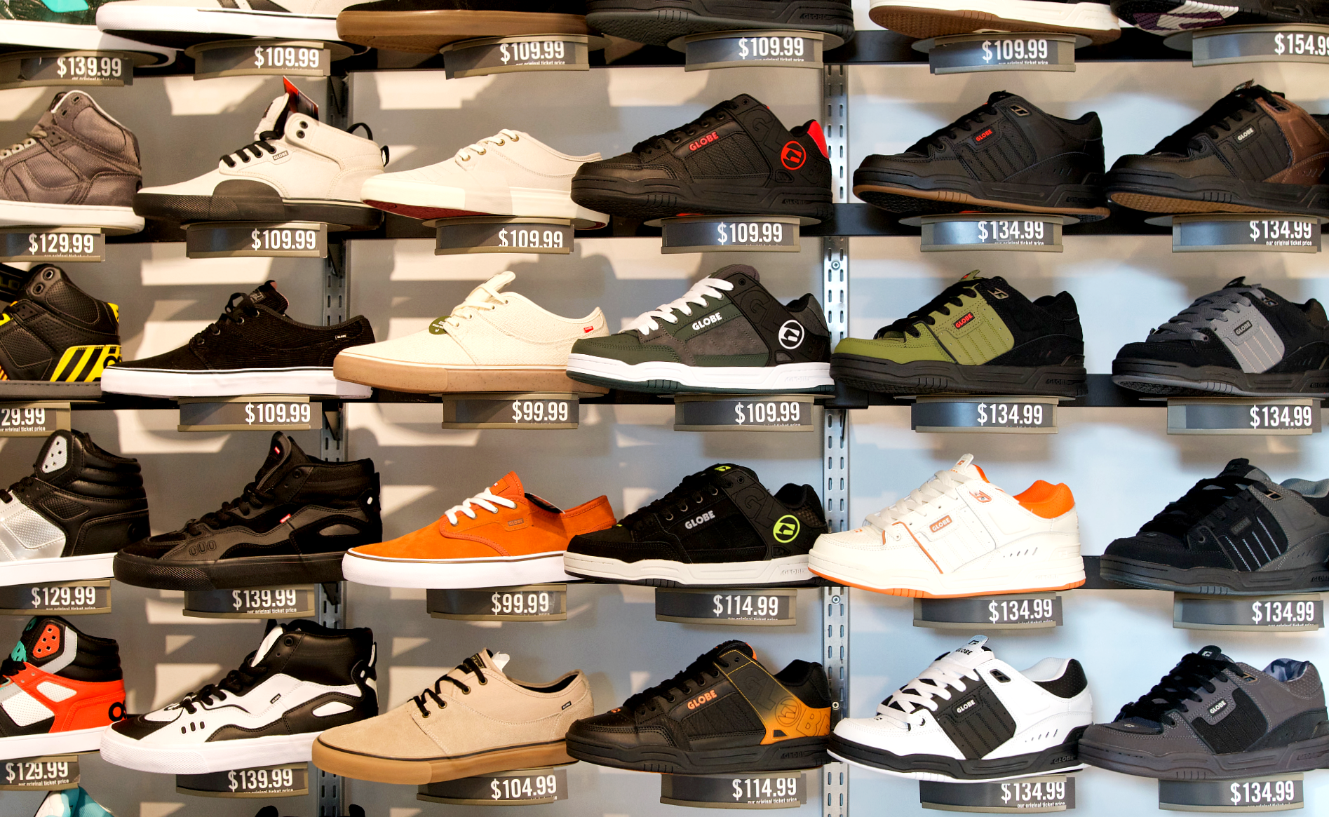 wall display of men's sneakers