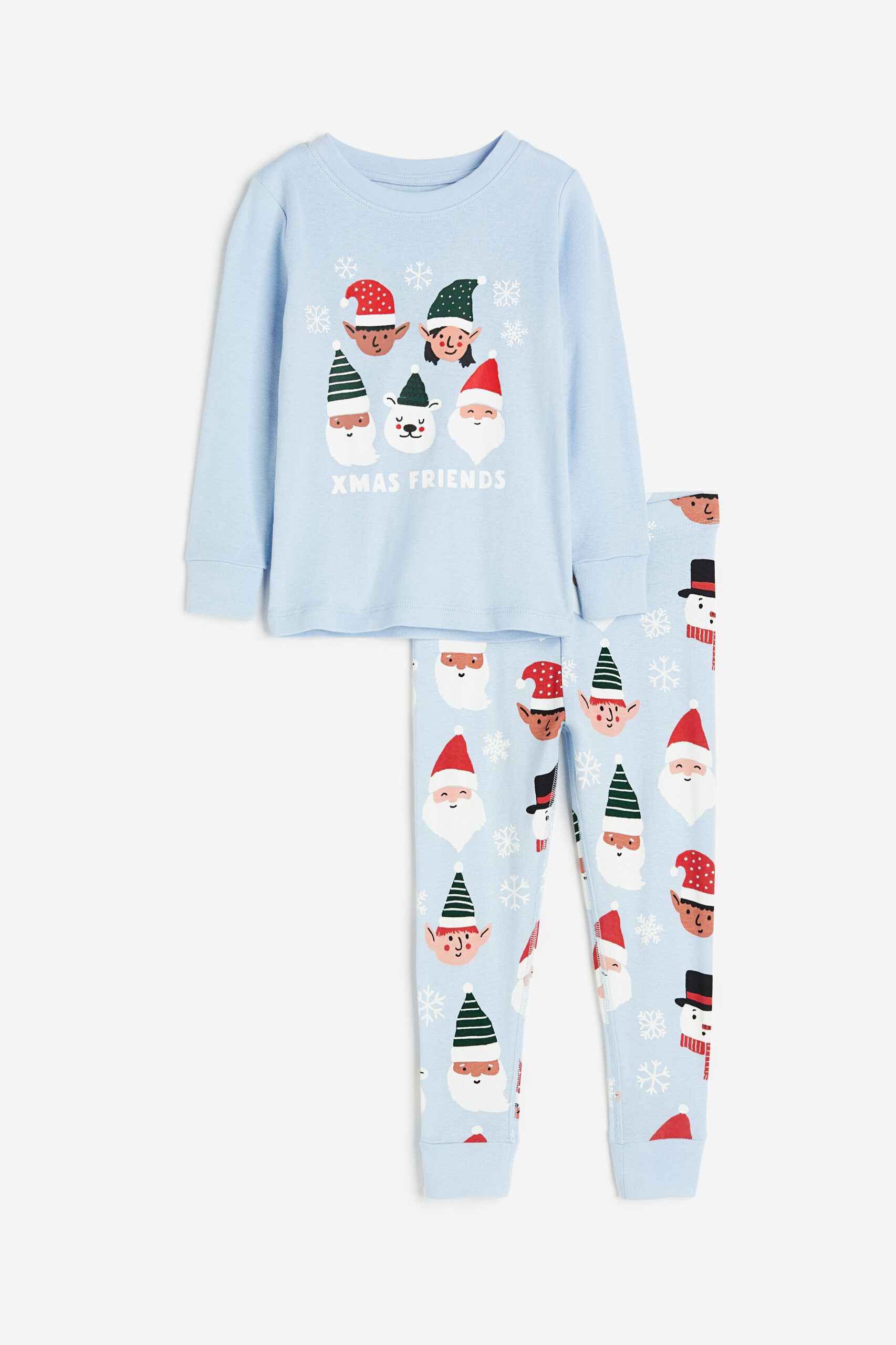 girls pajama set with "xmas friends" in writing with cartoon elves, snowmen, santa and bears