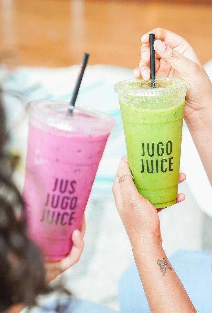two fruit and vegetable smoothies from Jugo Juice