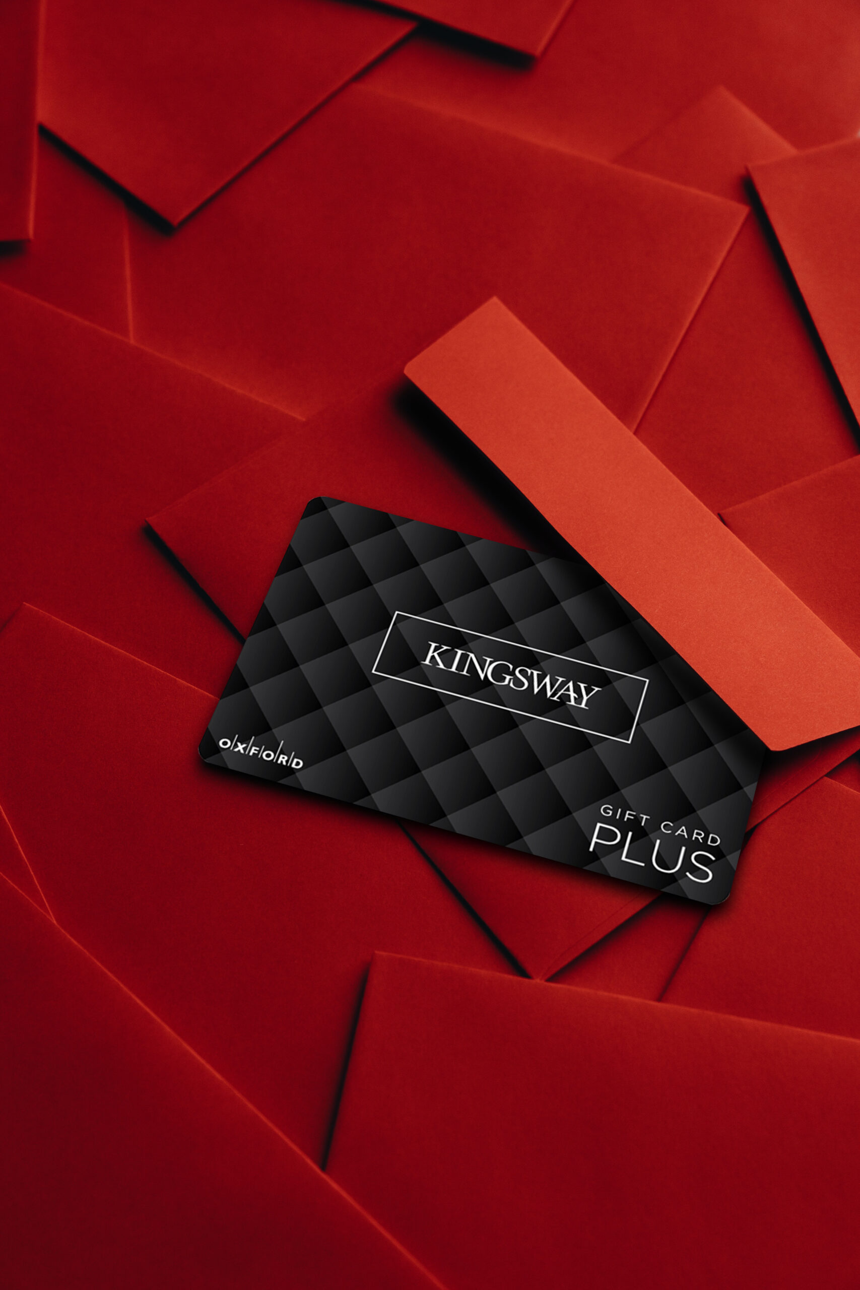 promo photo of Kingsway Mall gift card on top of red envelopes
