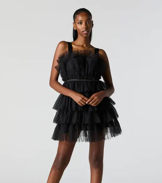 model wearing black tulle mini dress
