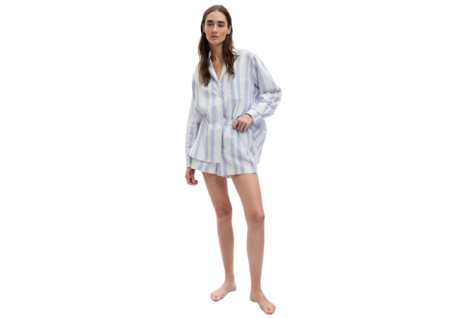 woman wearing poplin pajama set including long sleeve and shorts