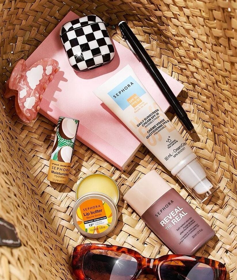 basket filled with makeup, skincare, and sunscreen from Sephora