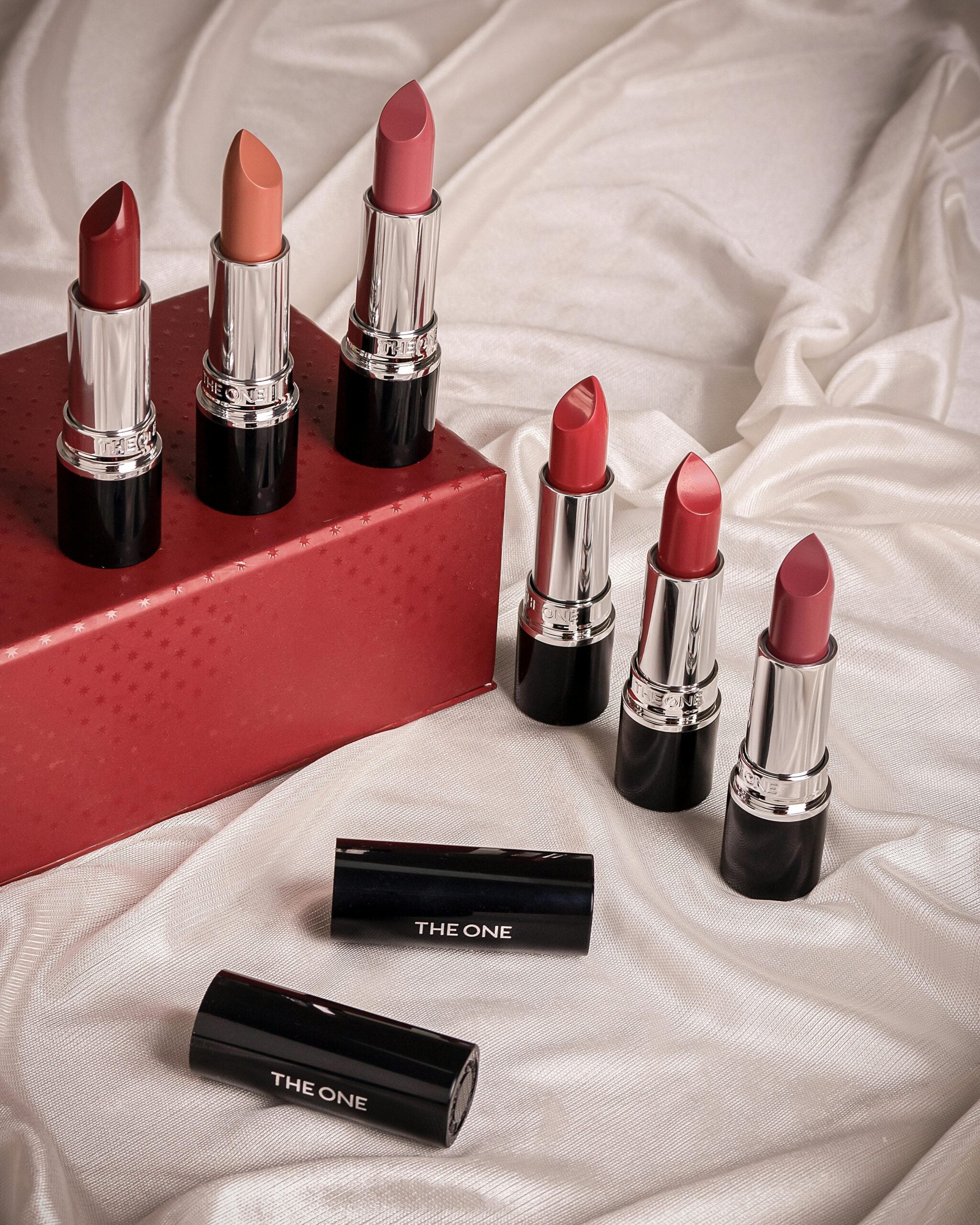 Set of size lipsticks in red box