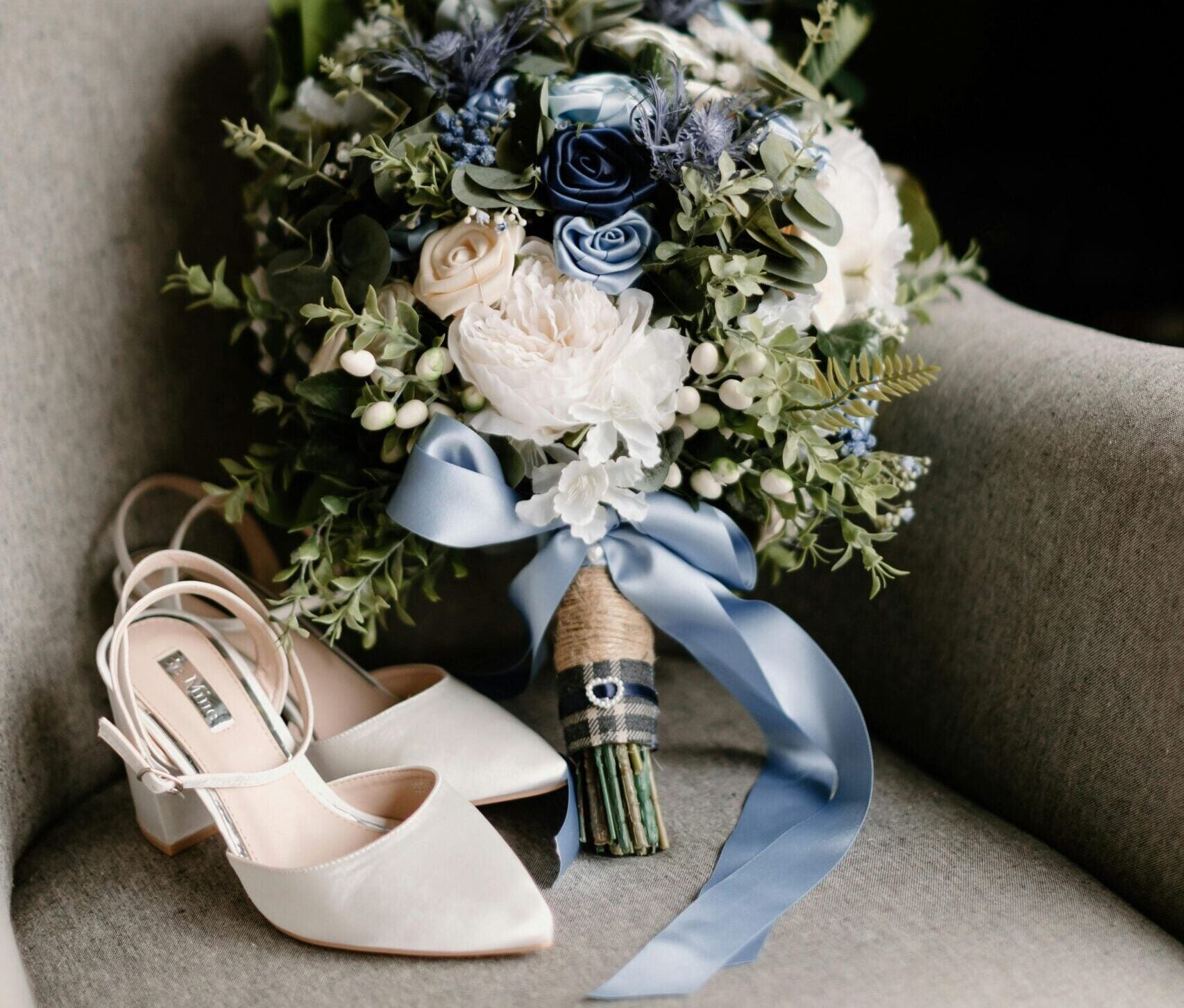 Wedding bouquet and white heels