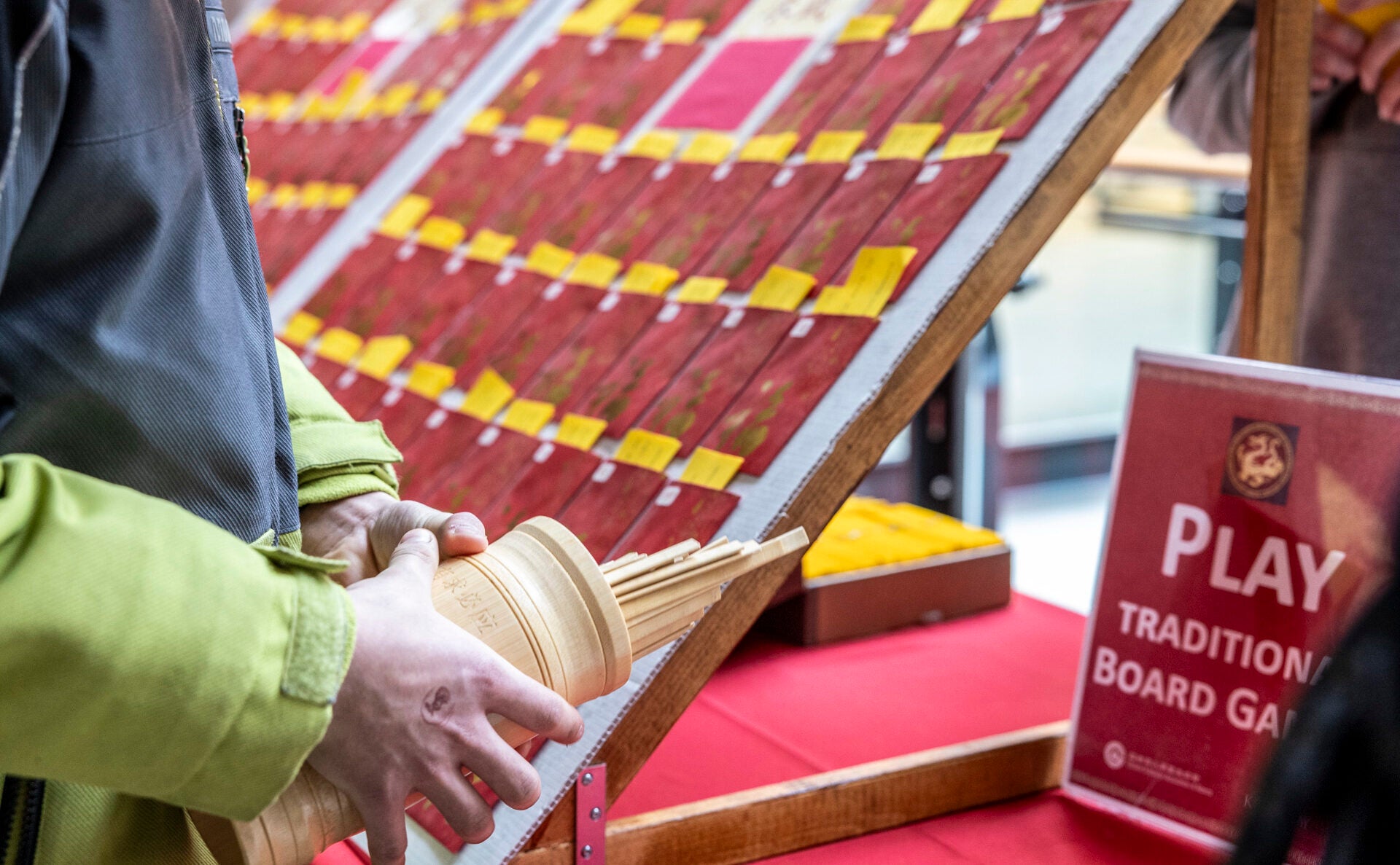 Chinese fortune telling sticks and red envelopes