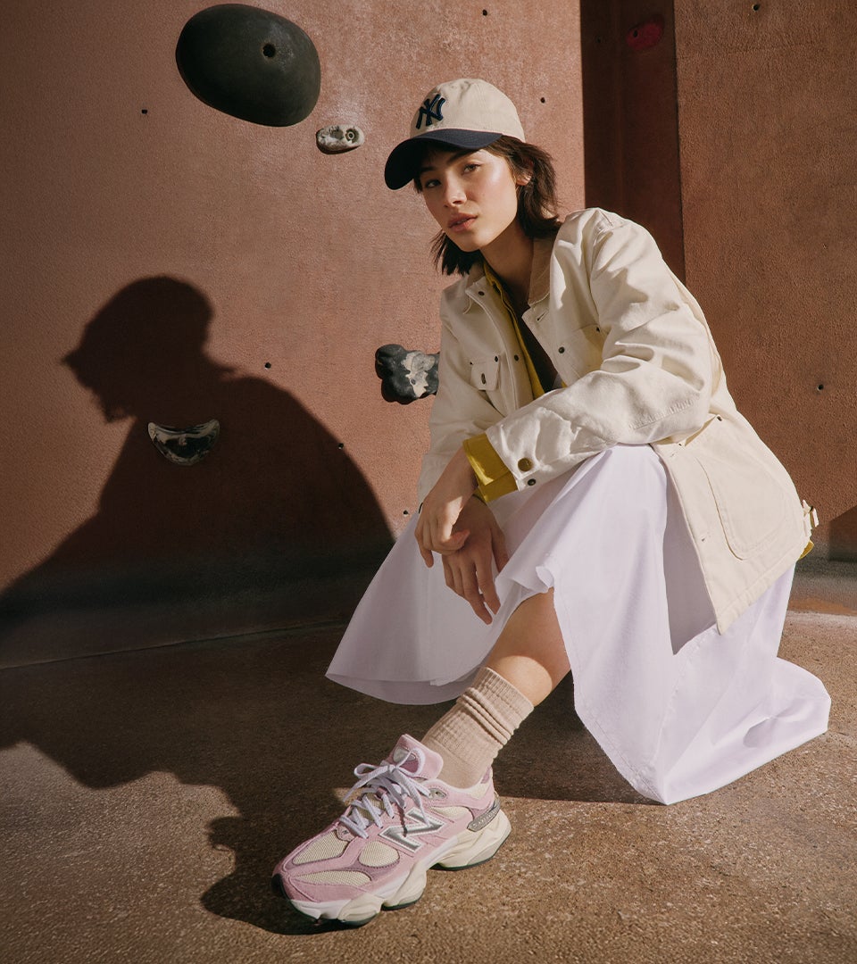 woman wearing white outfit with pink and beige shoes from Browns Shoes